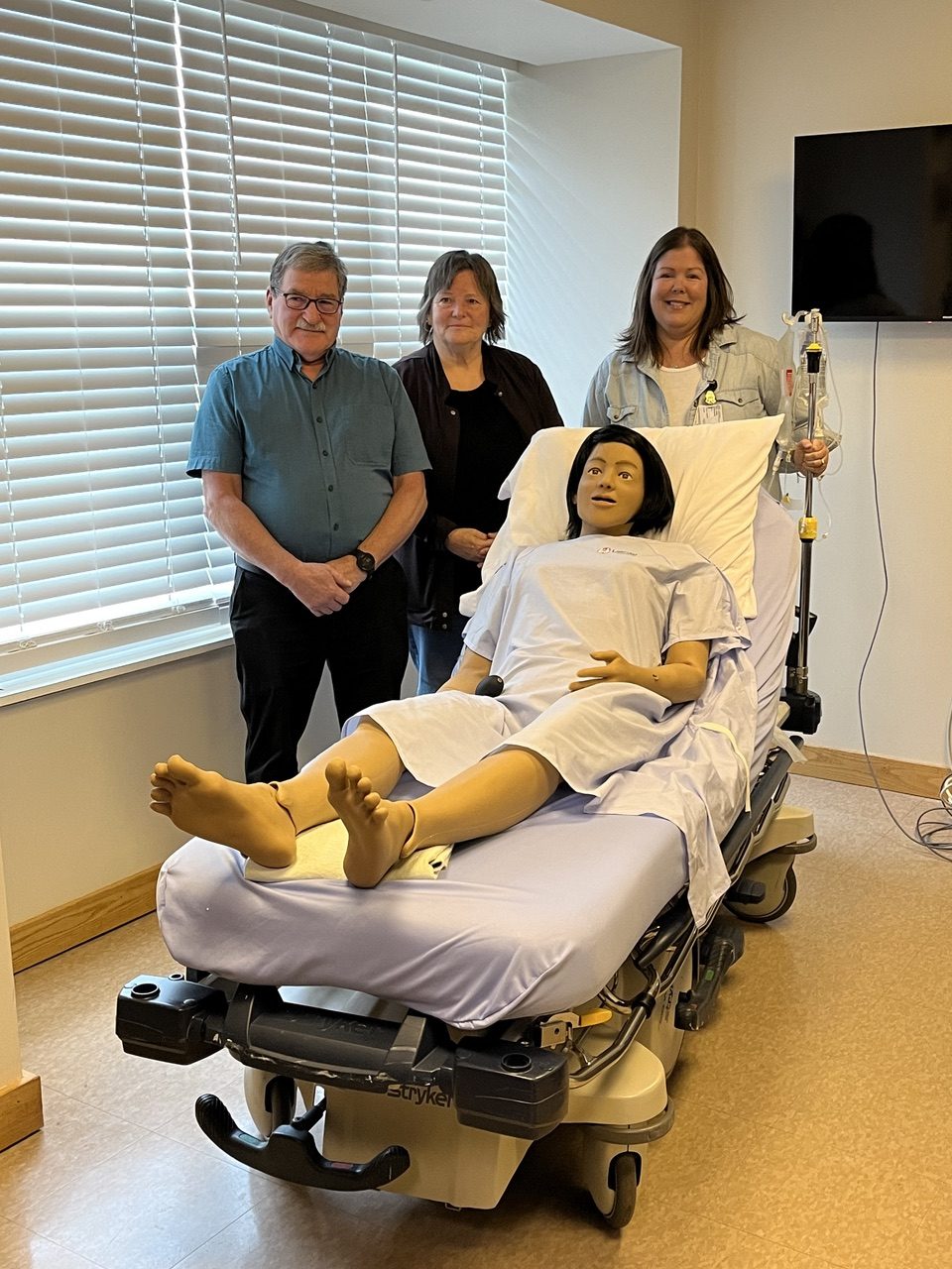 Allie Gallant, Micheline Downe and Kelly Harris with the Laerdal Nursing Anne simulator